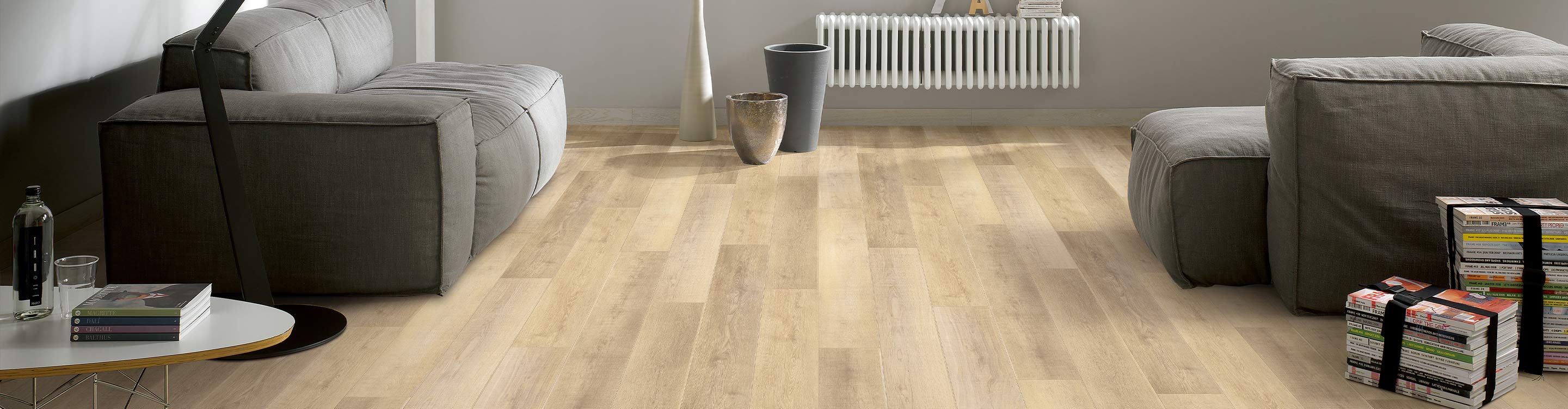 living room area with light hardwood flooring